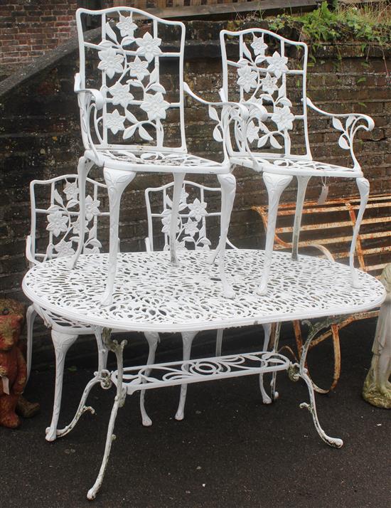 White metal table and 4 chairs